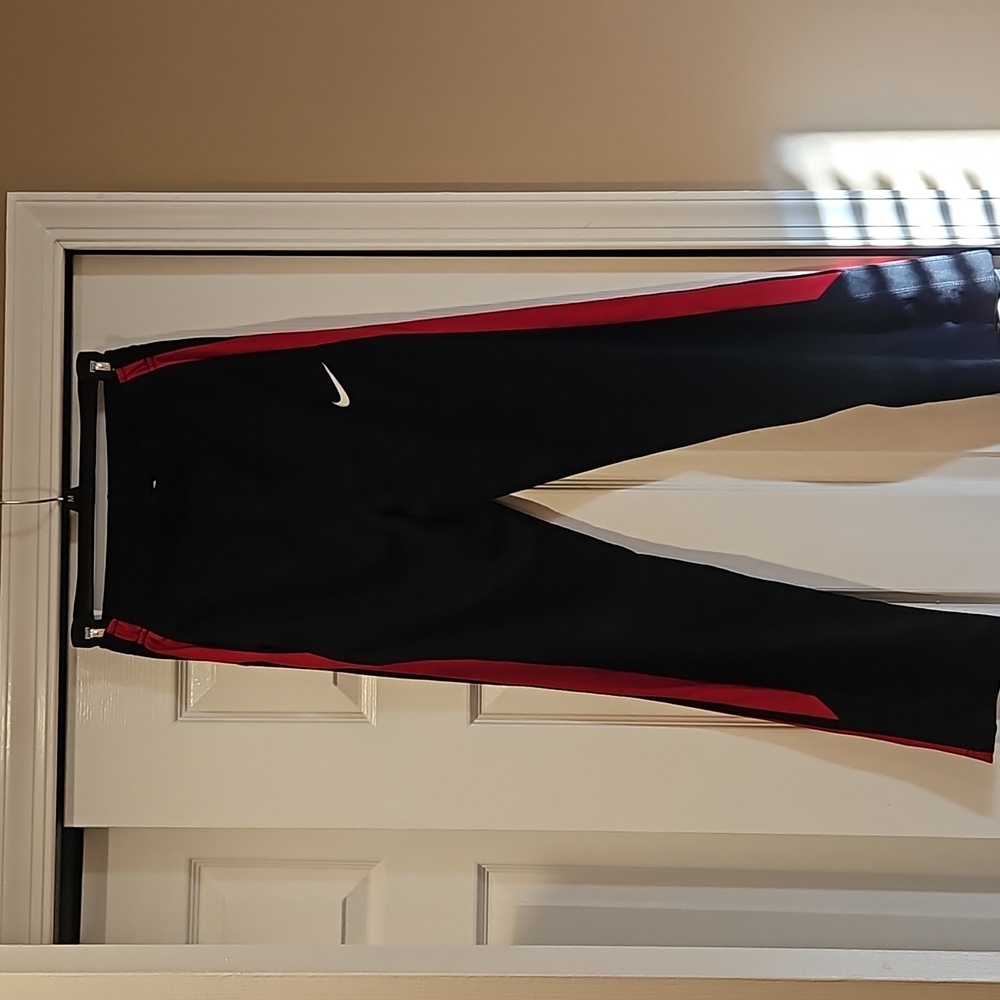 Nike Dri Fit Boys track pants, Large, Black with Red stripe